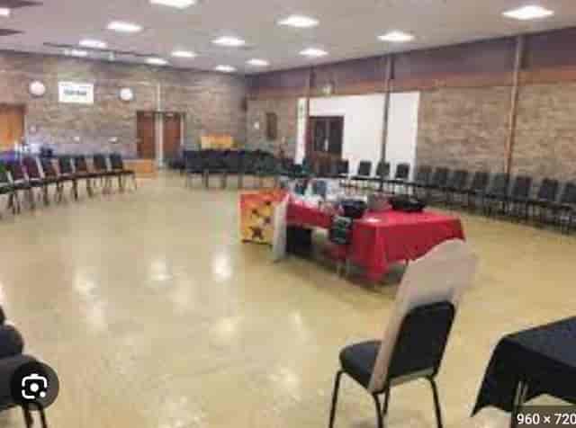 Versatile meeting space in EastendHomes, ideal for workshops and group discussions.