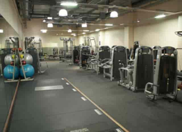 Well-equipped gym at Mile End Park for fitness classes and wellness events.