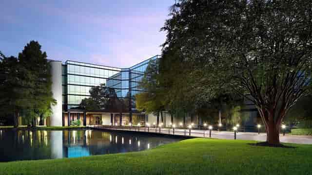 Post Oak Grand Ballroom at Omni Houston Hotel, modern venue with glass architecture for events.