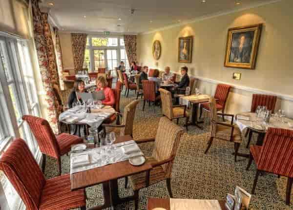 West Lodge Park Suite dining area, elegant decor for intimate meetings and events.
