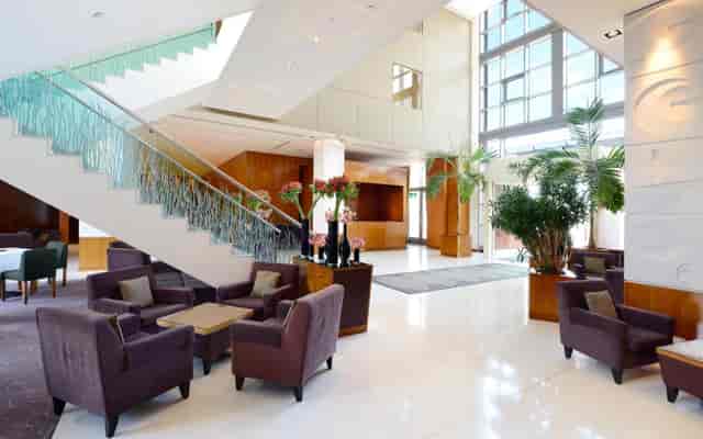 Luxury Suites lobby at Canary Riverside Plaza Hotel, modern design for events and receptions.