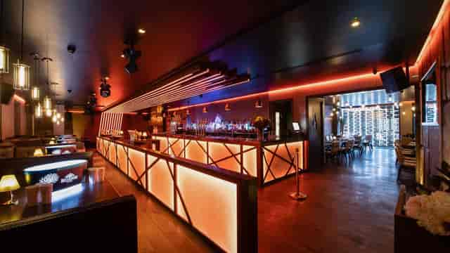 Modern Internet Cafe at The Harrow Club, vibrant bar, ideal for events and gatherings.