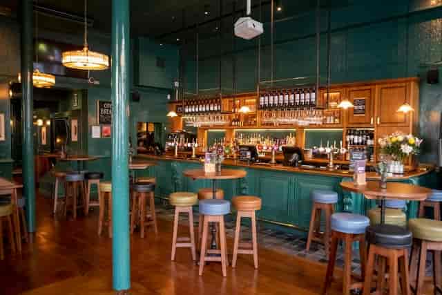 Stylish bar at The Courtfield pub, perfect for networking events and gatherings.