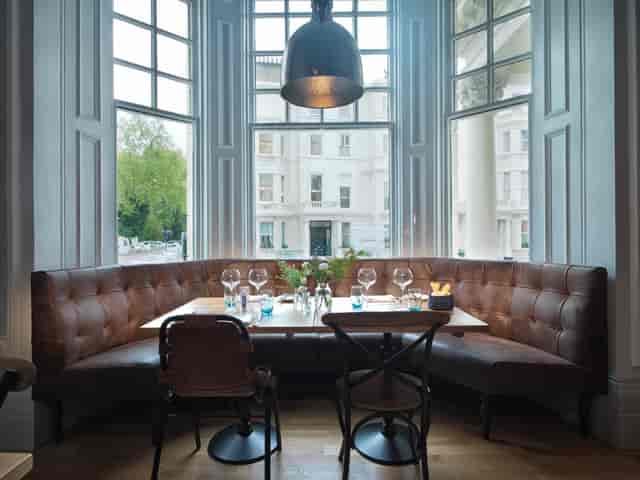 Stylish Lounge Bar with cozy leather seating, ideal for private events in Canary Wharf.