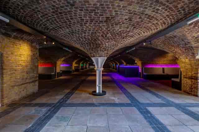 Princess Diana Exhibition in Dockside Vaults with arched brick ceiling, ideal for events.