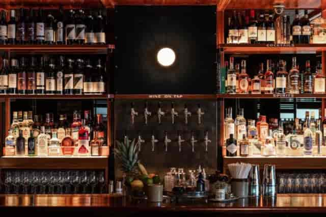 Well-stocked bar at Blacklock Restaurant, ideal for networking events and celebrations.