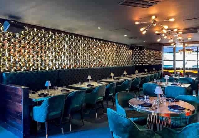 Stylish COCO Restaurants bar with elegant decor for intimate gatherings and corporate events.