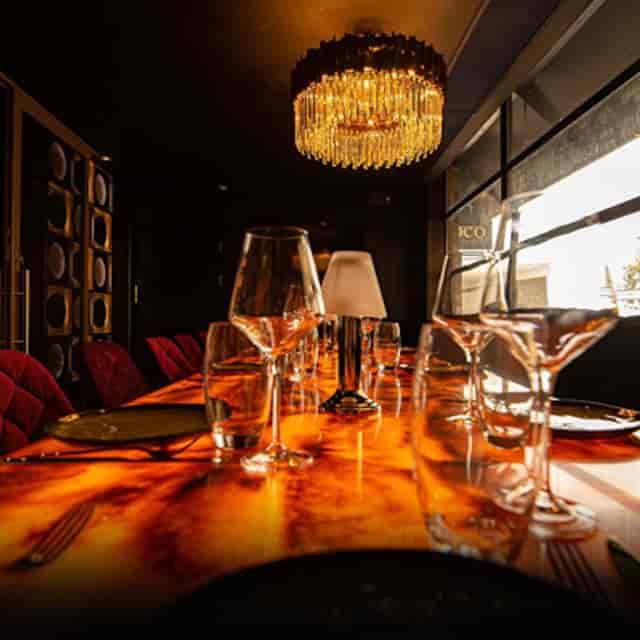 Elegant dining setup at COCO Restaurants, perfect for exclusive meetings and events.
