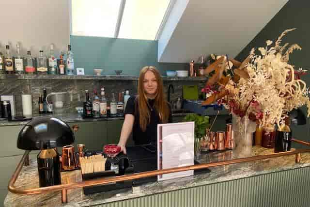 Stylish bar setup with polished countertop for events and meetings at Bar Brothers.