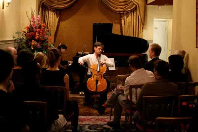 Intimate performance space at 1901 Arts Club for corporate events and private gatherings.