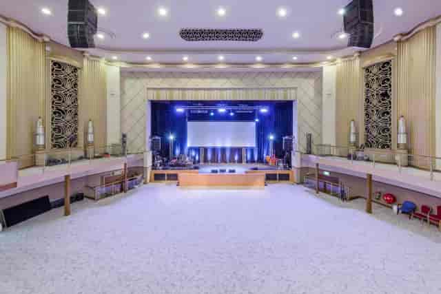Spacious Lighthouse Theatre hall with stage, ideal for weddings and conferences.
