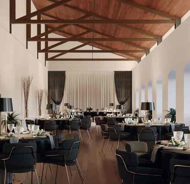 Elegant event space in Convento de Beato with round tables, ideal for weddings and corporate events.