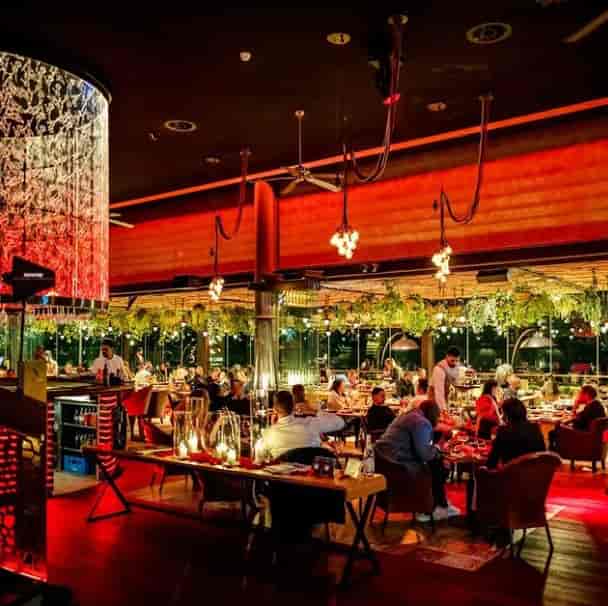 Vibrant Lisboa Hall dining space with warm lighting for upscale events and gatherings.