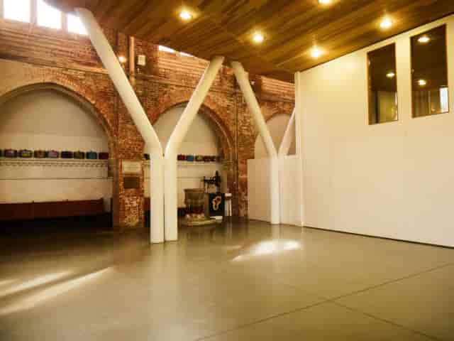 Giant Basement Space with exposed brick, perfect for versatile events and gatherings.