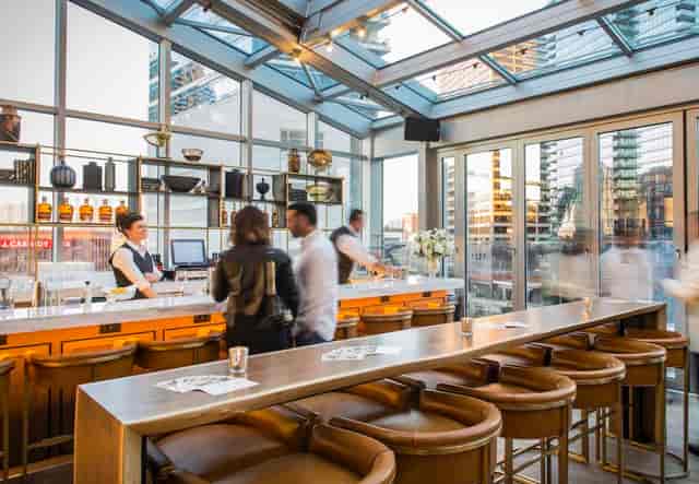 Stylish rooftop bar in Gibsons Italia, ideal for upscale events and networking.