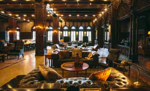 Elegant Cherry Circle Room venue with warm lighting for networking events and gatherings.