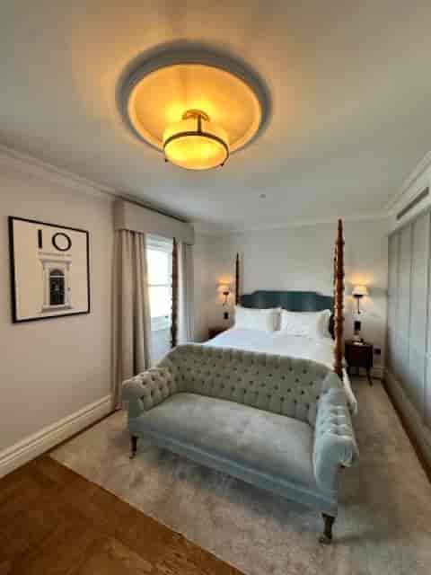 Elegant hotel suite at The Adria, perfect for meetings and retreats.
