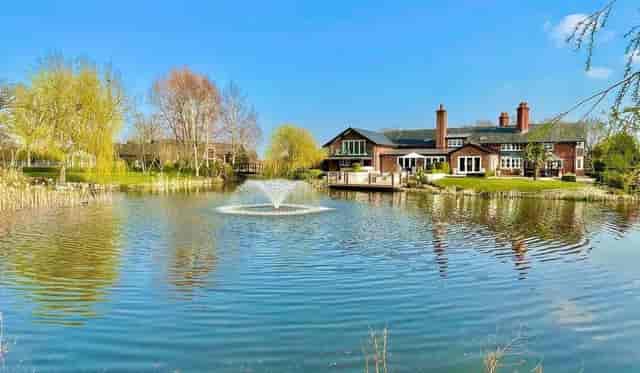 Charming barn venue with pond, ideal for weddings and outdoor events in Fernside.