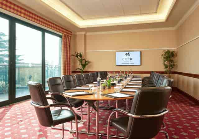 Whole Venue meeting room with circular table, ideal for professional gatherings and events.