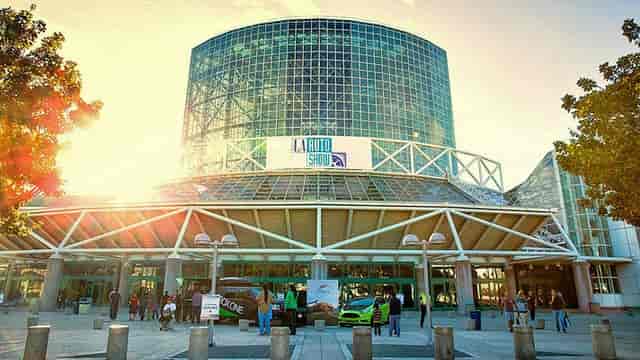 Vibrant SoCal convention center with glass facade, ideal for auto shows and networking events.
