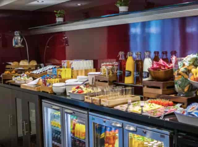 Refreshment station at Crowne Plaza Birmingham, featuring snacks and beverages for events.
