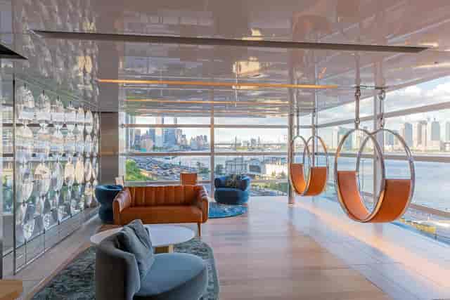 Modern meeting space with skyline views, ideal for networking and brainstorming events.