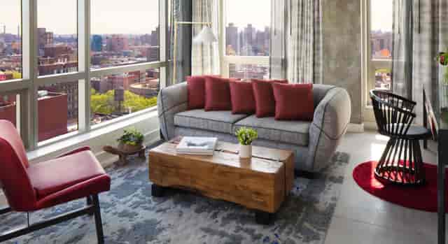 Stylish lounge at Hotel 50 Bowery, ideal for networking events with city views.