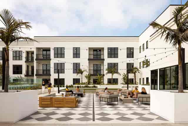 Stylish outdoor event space at Social Hub, Hollywood Park with modern architecture and greenery.
