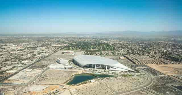 SoFi Stadium: modern venue with water feature, ideal for conferences and sports events.