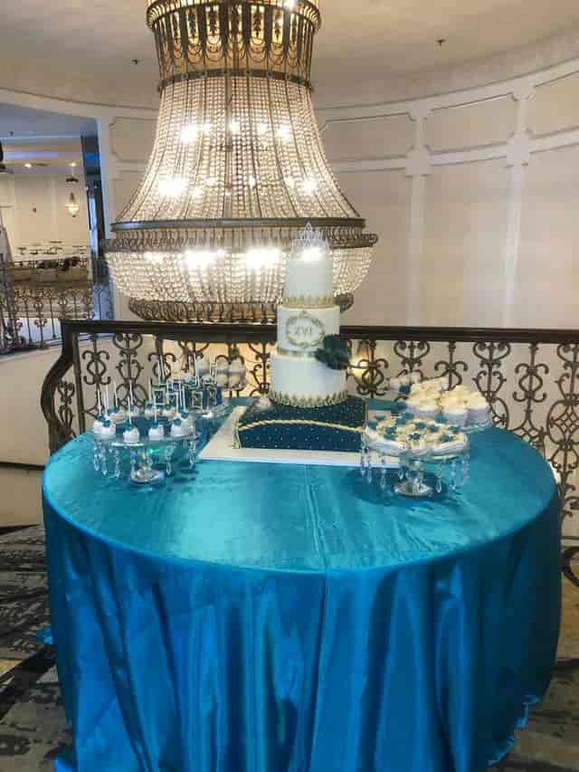 Elegant dessert table with multi-tiered cake for upscale events at Brandview Ballroom.