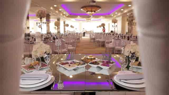 Elegant Brandview Ballroom banquet hall with fine china, perfect for weddings and corporate events.