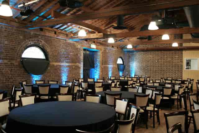 London Museum Docklands industrial venue, blue uplighting, corporate event, wedding