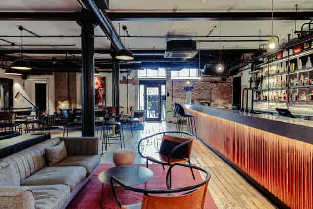 Stylish modern venue with comfortable seating for intimate meetings and events.