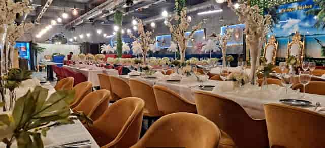 Elegant banquet hall with floral centerpieces for upscale events and celebrations.