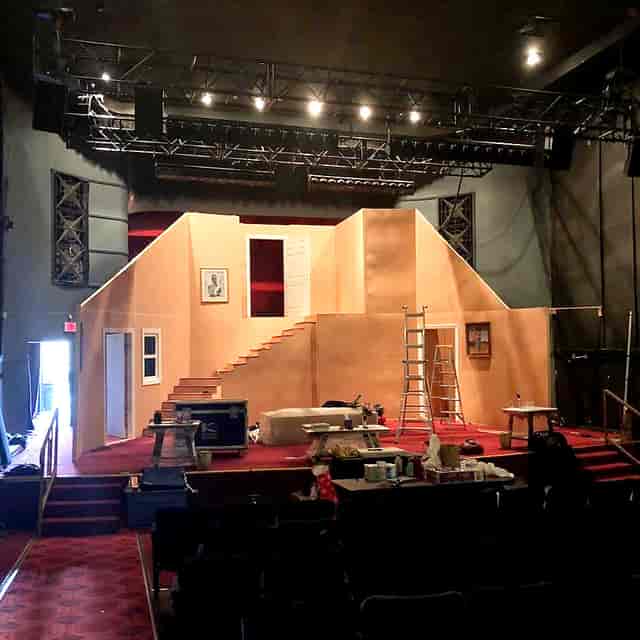 Partially constructed stage at The Miracle Theater for event production setup.