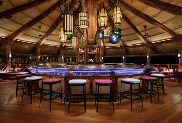 "Abalone Lounge bar with warm wood accents, perfect for cocktail receptions and networking events."