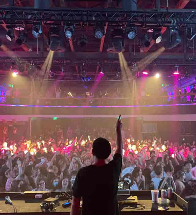 Vibrant DJ performance at The Vermont Hollywood event, showcasing energetic crowd engagement.