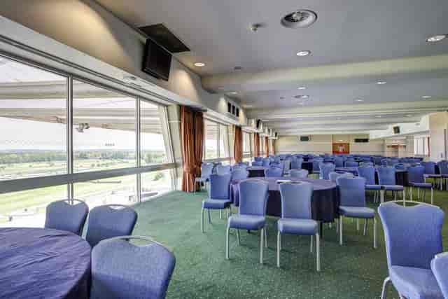 Gold Cup Suite at Sandown Park: spacious venue with large windows for events and meetings.