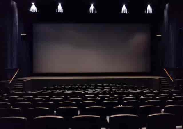 Spacious Harmony Gold theater with tiered seating for corporate events and film screenings.