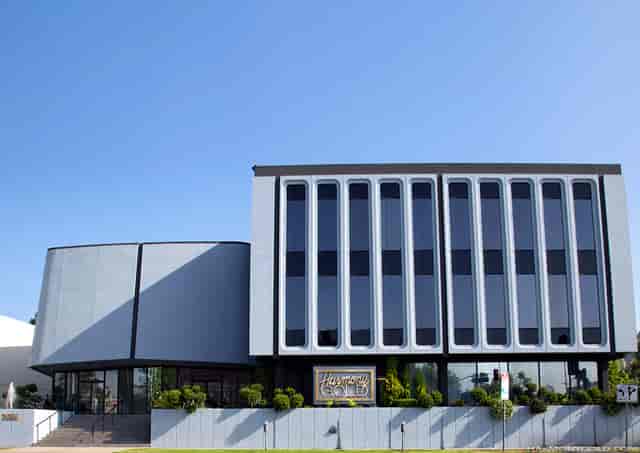 Modern Harmony Gold movie theater with large windows, ideal for events and meetings.