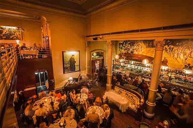 Vibrant Speakeasy venue with elegant decor for upscale events and intimate gatherings.