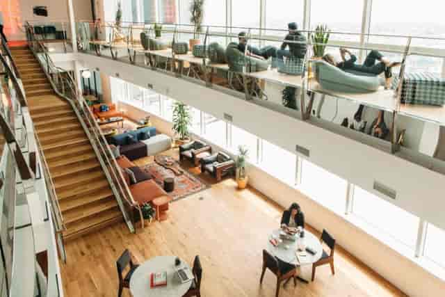 Modern open-concept event space with natural light for meetings and workshops.