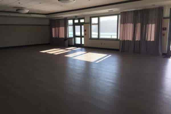 Spacious Lake Merced Boathouse event venue with natural light for meetings and gatherings.