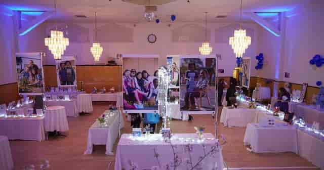Elegant banquet hall with ambient lighting, perfect for networking events and showcases.
