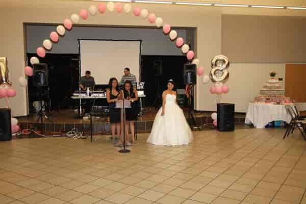 Donworth Hall event space with pink balloon arch for a celebration featuring a young girl.