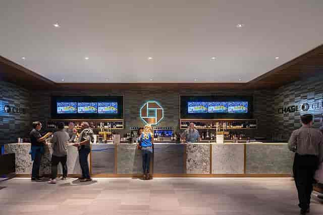 Top floor event space at Chase Center with modern bar, ideal for networking events.