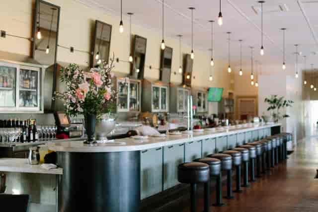 Stylish bar at Presidio Social Club, ideal for networking events and gatherings.