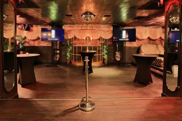 Main Room at Hawthorn SF: sleek cocktail tables for stylish networking events.
