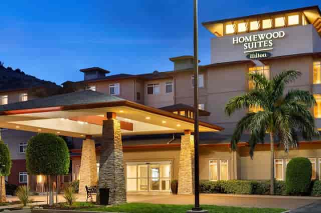 Homewood Suites entrance, modern architecture, ideal for meetings and events.