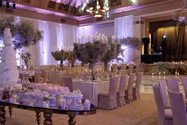 Elegant event space with floral arrangements for upscale weddings in Oakland.